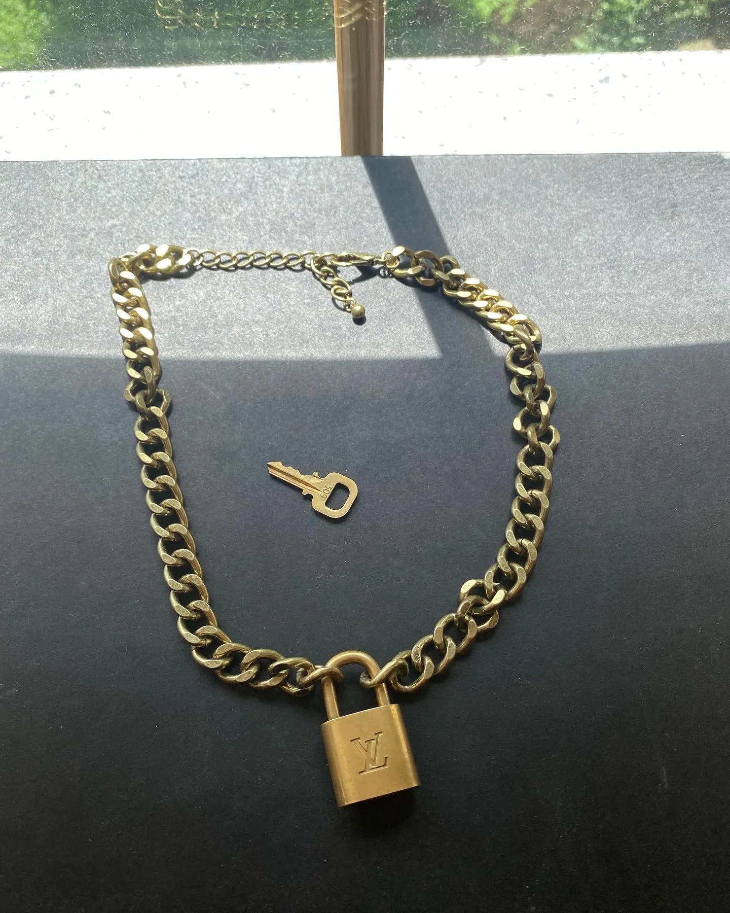 Louis vuitton deals lock necklace vintage